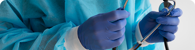 Surgeons operating with instruments during an ENT procedure
