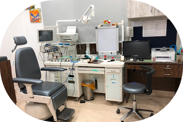 Examination room at the Sankalp ENT and cochlear implant clinic, with the ENT chair and diagnostic equipment